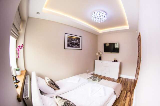 Апартаменты Zakopiańskie tarasy SPA Apartament Koliba Закопане-11